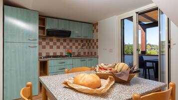 Panoramic Penthouse | Private kitchen | Highchair