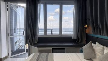 Deluxe Double Room, 1 Queen Bed, Balcony, Beach View | In-room safe, desk, laptop workspace, soundproofing