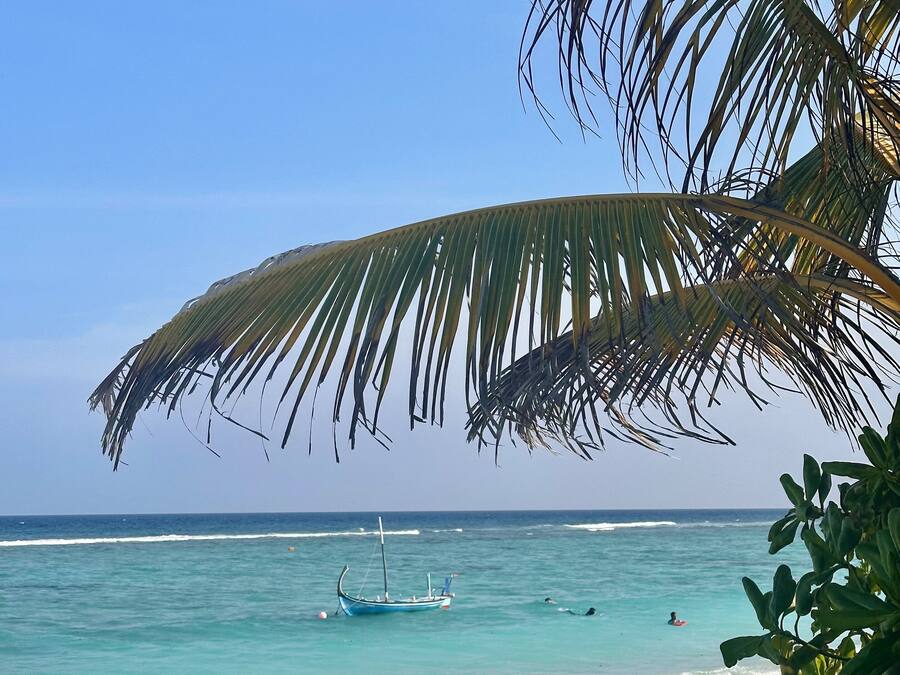 On the beach, white sand, beach towels