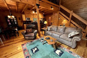 Télévision, cheminée, baby-foot