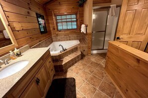 Bathtub, jetted tub, hair dryer, towels