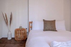 Departamento básico, 2 camas matrimoniales | 2 habitaciones, tabla de planchar con plancha y ropa de cama 