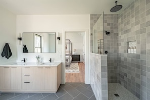 Bathtub, hair dryer, towels, soap