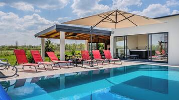 Seasonal outdoor pool, a heated pool