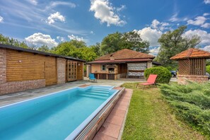 Seasonal outdoor pool, a heated pool