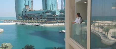 Apartment, 2 Bedrooms, Partial Sea View | Minibar, in-room safe, soundproofing, free WiFi