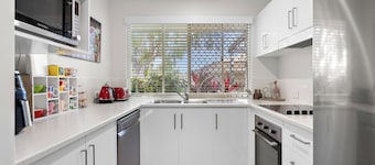 Unit 1 - Renovated 2 Bedroom Ground Level Villa