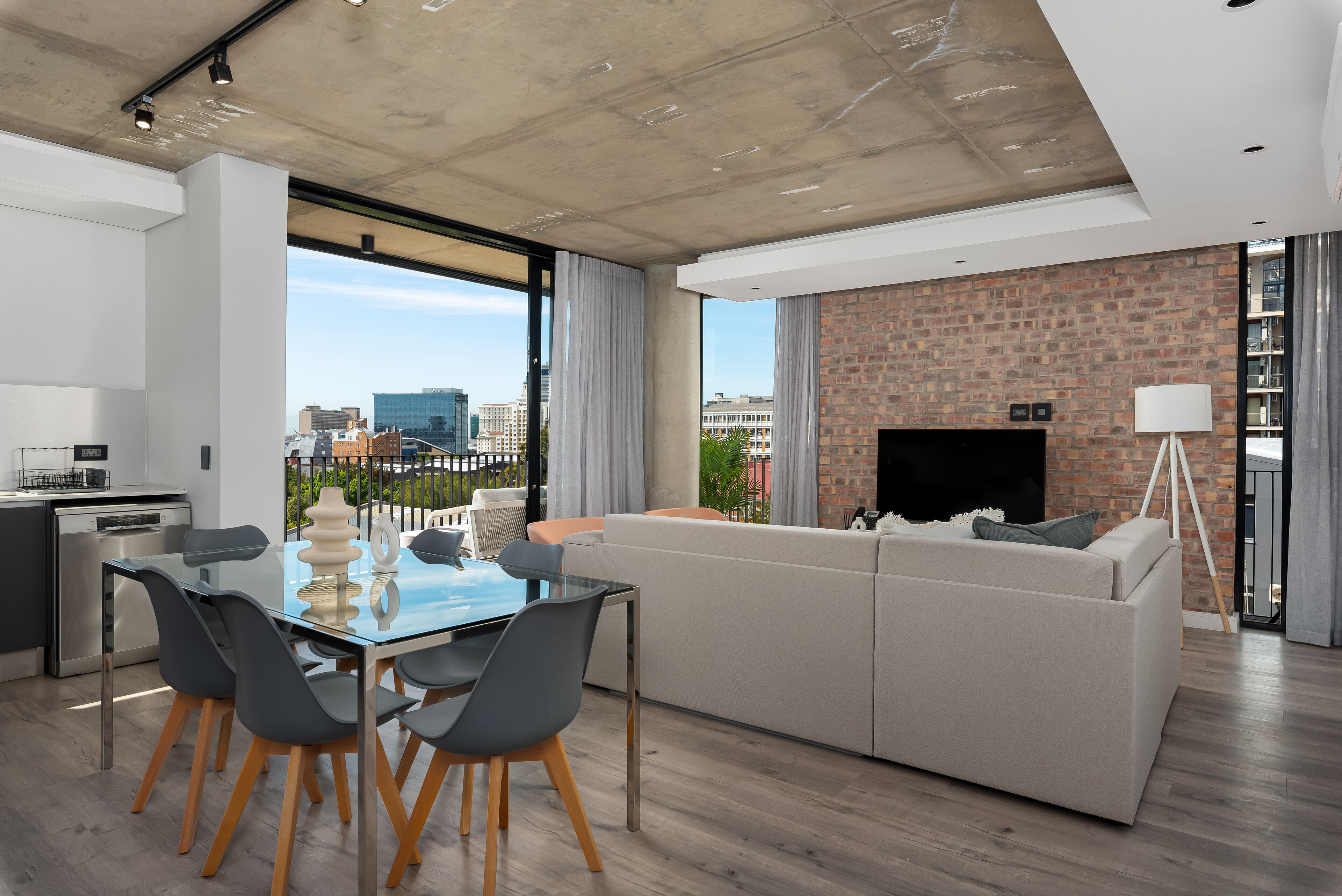 Comfort appartement | Woonruimte | Een 40-inch flatscreentelevisie met kabelzenders en televisie