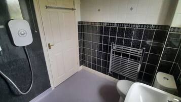 Shower, towels, soap, shampoo