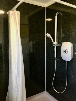 Shower, towels, soap, shampoo