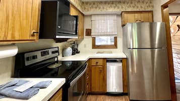 Condo, 2 Bedrooms | Private kitchen | Fridge, oven, coffee/tea maker