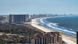 A coastal hotel with multiple floors, beachfront location, and a view of the ocean. - 2307 Royale Palms 3 Bedroom Condo (Myrtle Beach)