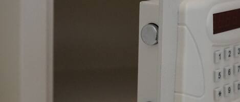 A microwave with a keypad and a small display.