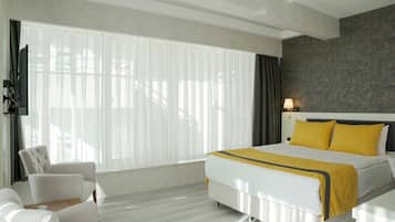 Deluxe Double Room | Premium bedding, free minibar items, in-room safe, laptop workspace