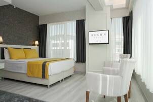 Deluxe Double Room | Free minibar items, in-room safe, laptop workspace, iron/ironing board