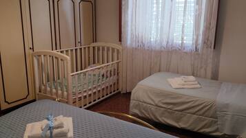 2 bedrooms, desk, iron/ironing board, travel crib
