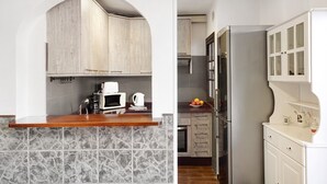 A kitchen with a stone backsplash, wooden countertop, and a built-in oven.