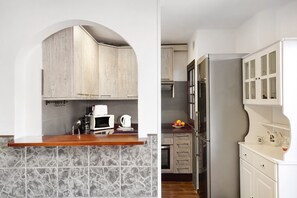 Een koelkast, een magnetron, een oven, een kookplaat