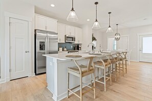Deluxe Townhome | Private kitchen | Full-size fridge, microwave, oven, stovetop - Cambridge Reserve by KEES Vacations (Kill Devil Hills)