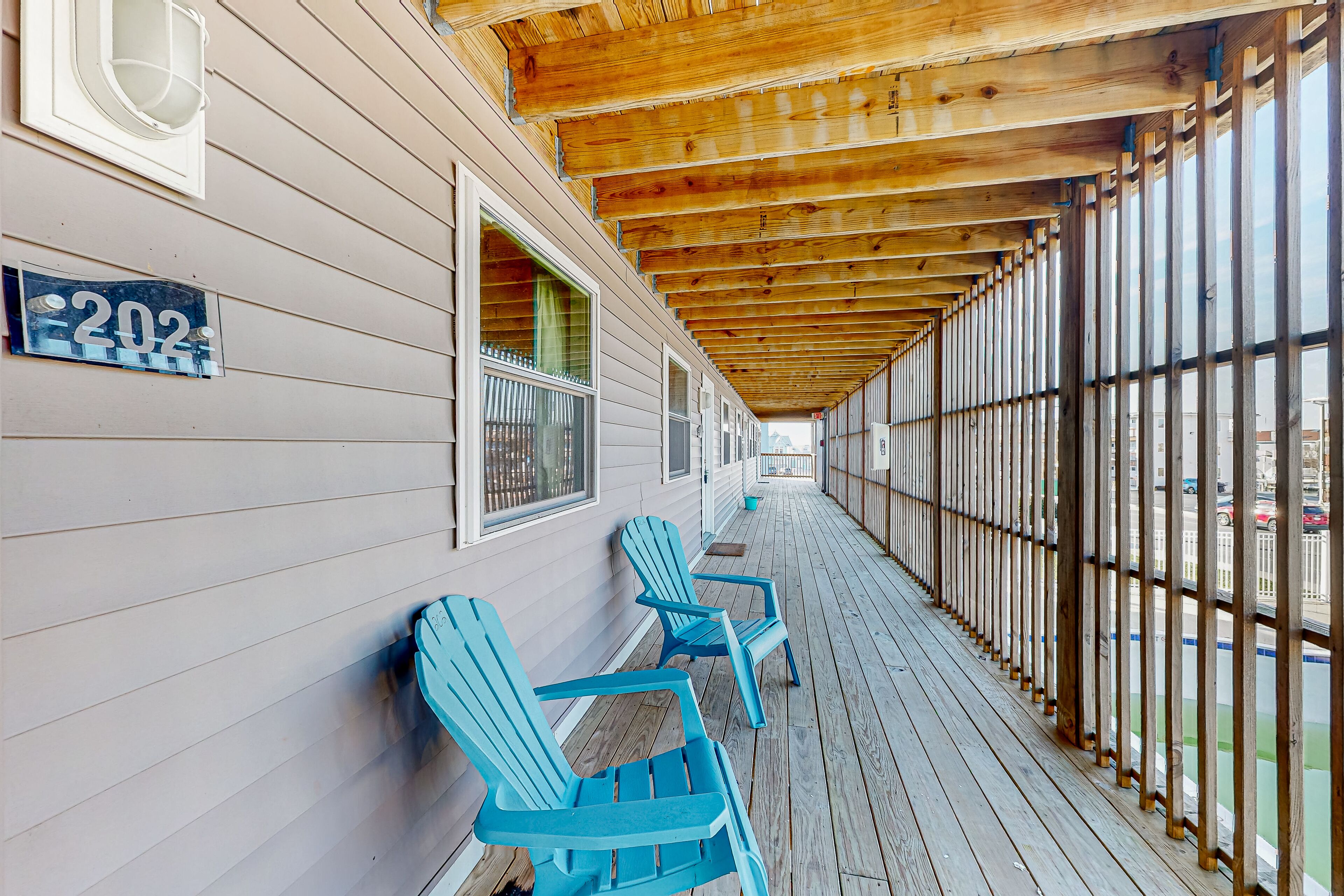 Second-floor condo with water view, pool & AC - walk to beach & boardwalk