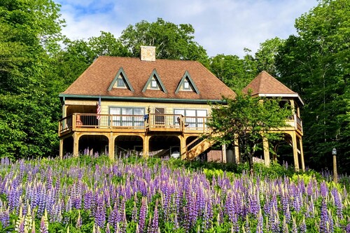 Dog-friendly, lake-view chalet with gazebo, wraparound deck, grill, & fireplace