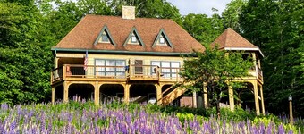 Dog-friendly, lake-view chalet with gazebo, wraparound deck, grill, & fireplace