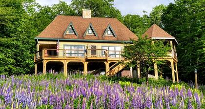 Dog-friendly, lake-view chalet with gazebo, wraparound deck, grill, & fireplace