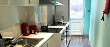 Fridge, microwave, electric kettle, toaster