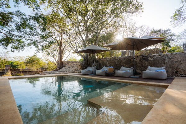 2 outdoor pools, open 9:00 AM to 7:00 PM, pool umbrellas, pool loungers