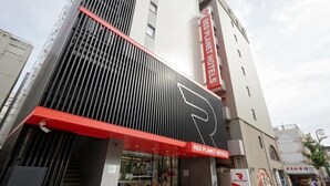A modern building with a prominent Red Planet Hotels sign. - Red Planet Sapporo Susukino Central (Sapporo)