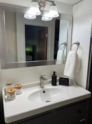 Hair dryer, towels, soap, shampoo