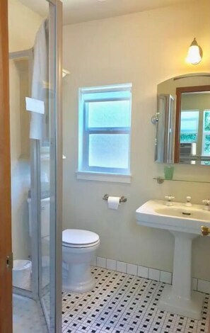 Shower, hair dryer, towels, soap