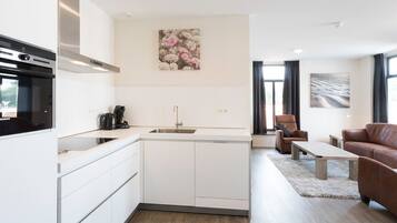 Réfrigérateur, four, plaque de cuisson, lave-vaisselle