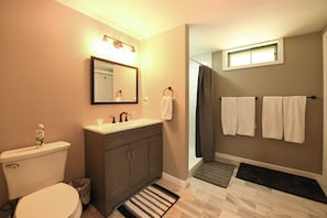 Combined shower/bathtub - Newly Remodeled 5-BR Waterfront home on Sebago Lake – Spacious and Stunning! (Raymond)