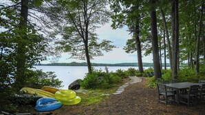 Outdoor dining - Charming pet-friendly camp on peaceful Panther Pond! (Raymond)