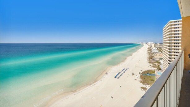 A beachfront hotel with a view of the ocean and beach. - Waterfront condo w/ resort pool & daily tickets (Panama City Beach)
