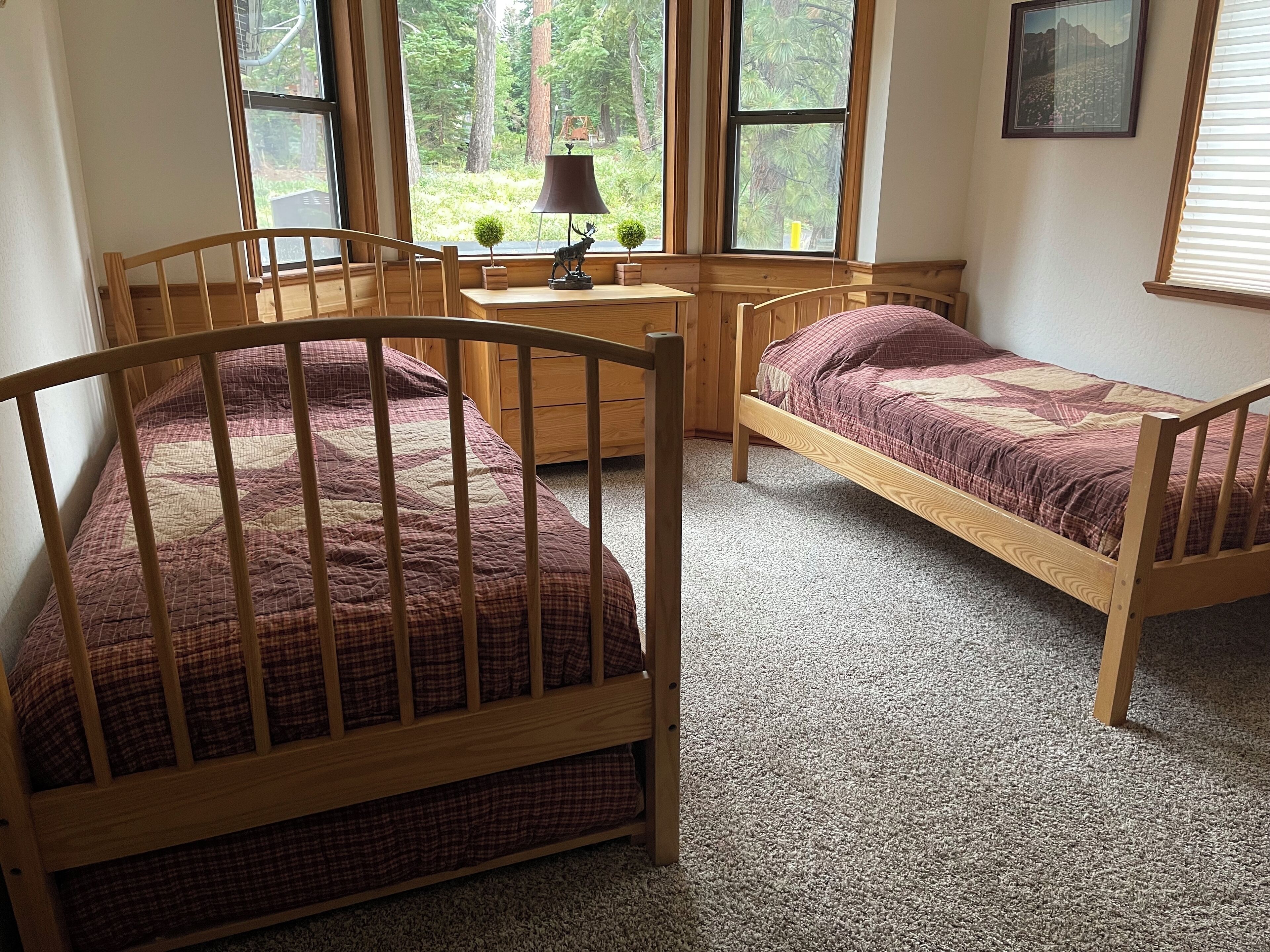 downstairs hallway bedroom w/2 twin beds + 1 twin trundle 