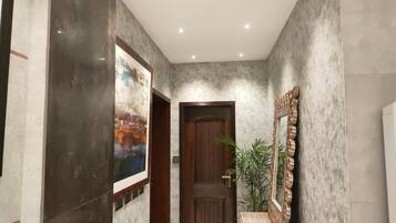 Shower, designer toiletries, towels, soap