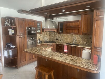 Fully furnished new top floor condo in the center of charming Aviano w/ terrace.