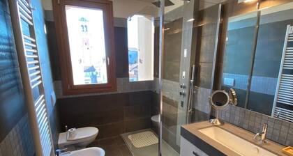 Fully furnished new top floor condo in the center of charming Aviano w/ terrace.
