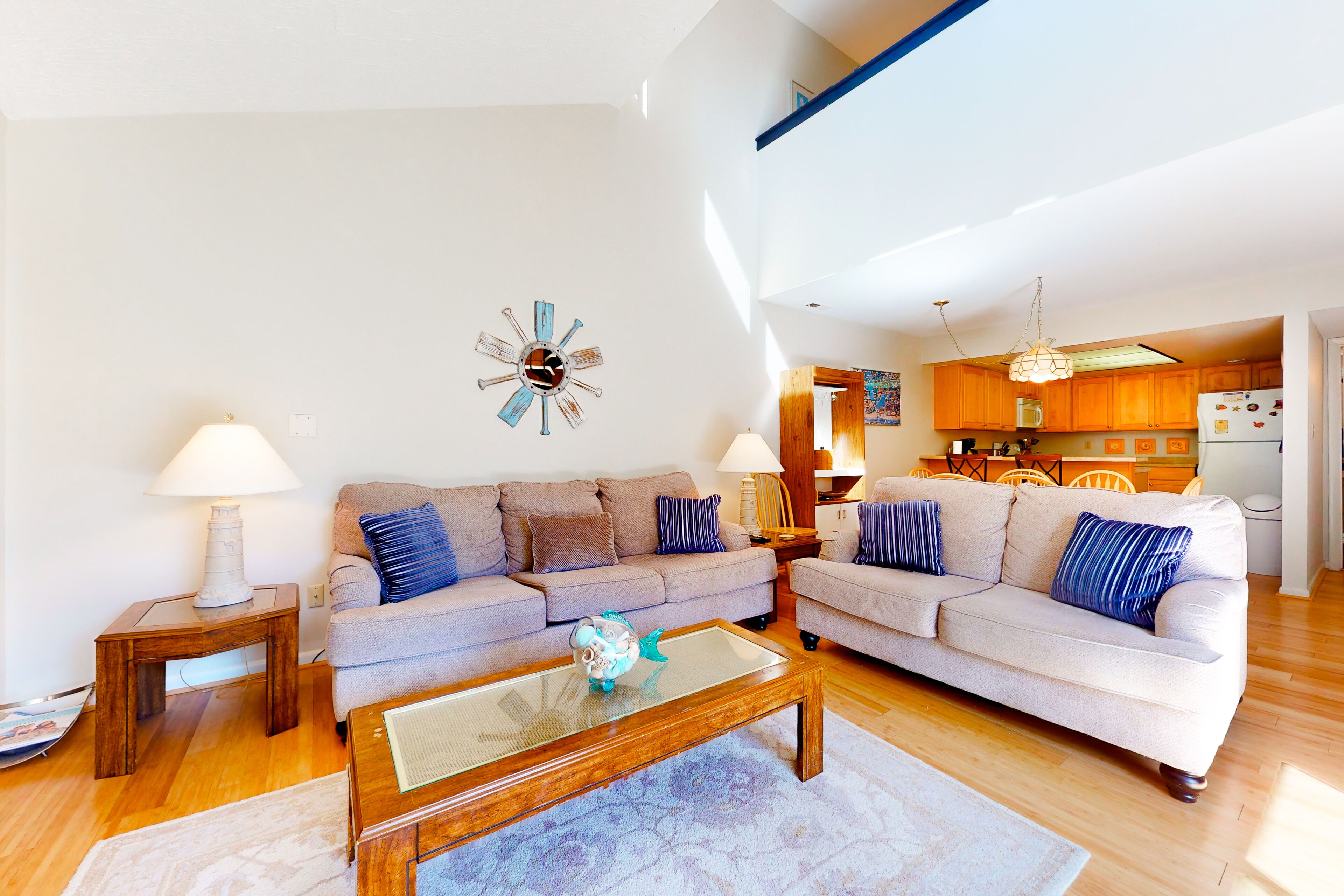 Sea Colony condo with private beach access, a large deck, pool, and hot tub