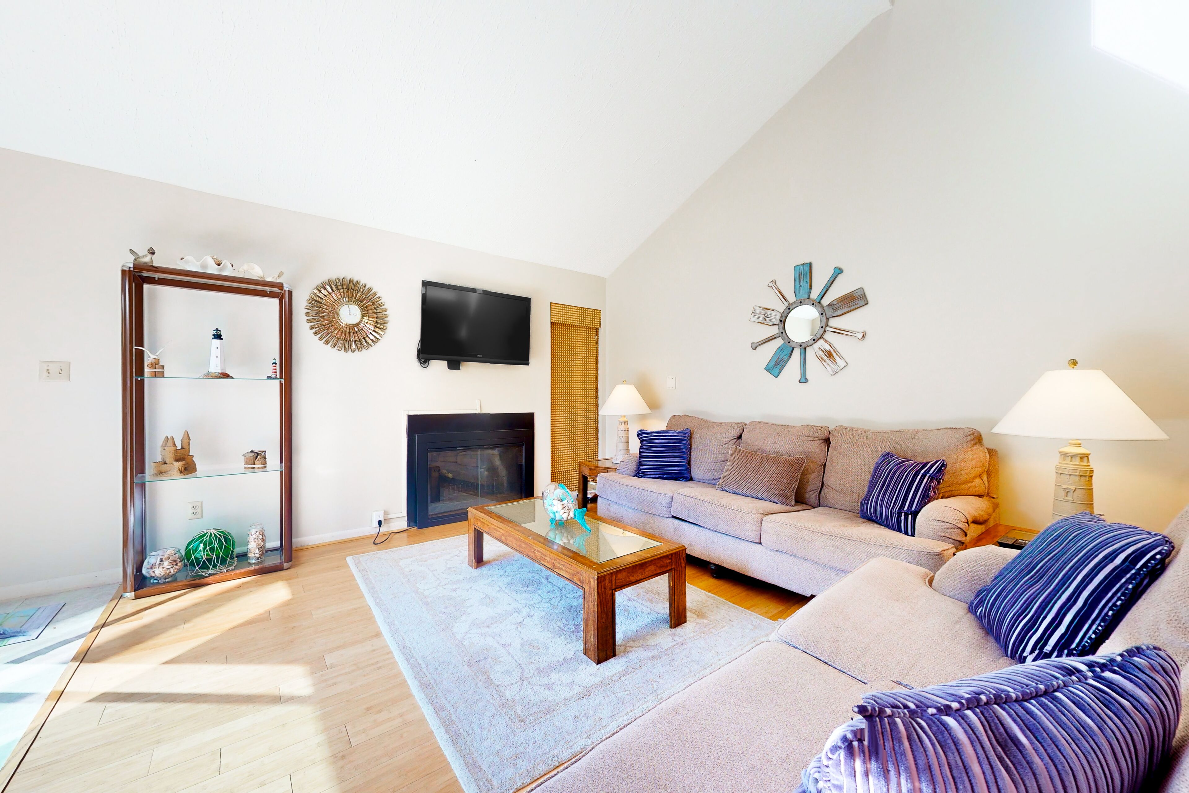 Sea Colony condo with private beach access, a large deck, pool, and hot tub