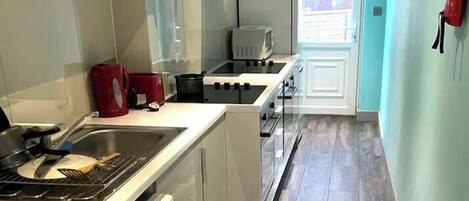 Fridge, microwave, electric kettle, toaster