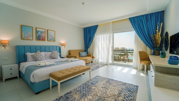 Luxury Double or Twin Room, Sea View, Beachside | Minibar, in-room safe, desk, blackout curtains