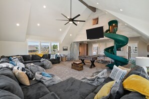 Smart TV, fireplace, DVD player, foosball