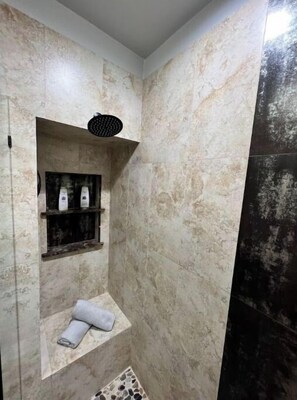 Shower, hair dryer, towels, soap