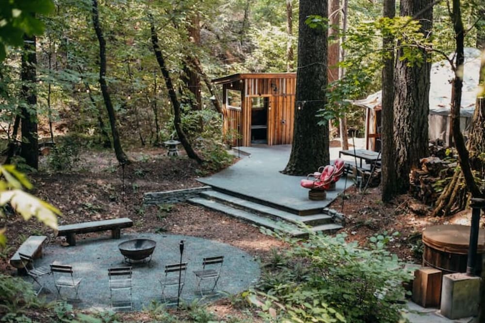 Your private Yurt in the woods -2 miles to town!