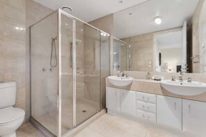 Bathtub, towels, shampoo