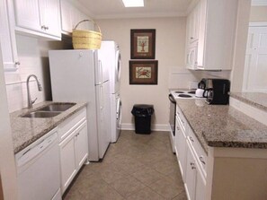 Fridge, microwave, oven, stovetop - W2 Ocean Walk Resort upstairs 2 bed king and two twins next to back pool (Saint Simons Island)