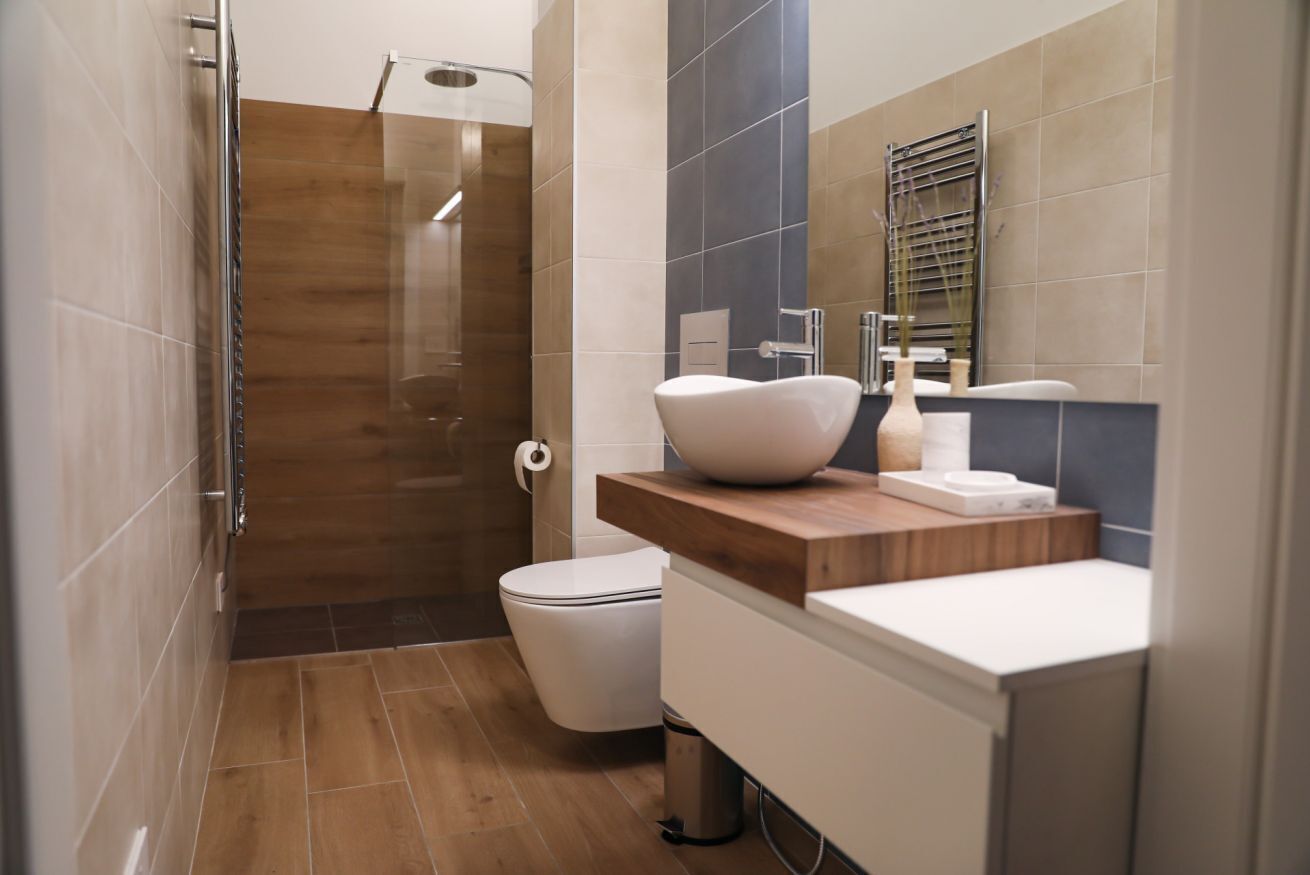 Shower, hair dryer, towels, toilet paper